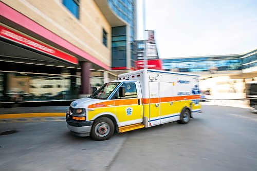 Ambulances pull in and out of the Health Sciences Centre in May. (Mikaela MacKenzie/Winnipeg Free Press)