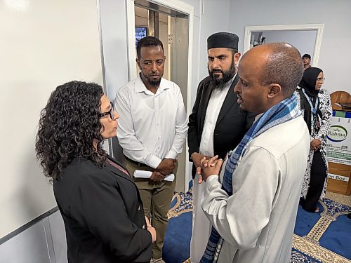 Morgan Modjeski / FREE PRESS
Culture Minister Nellie Kennedy, left, speaks with leaders from Winnipeg Muslim community including Rahma Islamic Centre Director and Imam Feisel Adem and Manitoba Islamic Association chair, Hakim Ghulam at the centre on July 30, 2026.