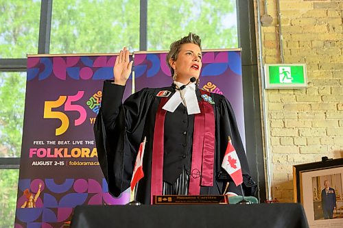 Mike Sudoma/Free Press
Citizenship Judge Suzanne Carrier says a vow to event attendees during a citizenship ceremony put on by the IRCC and Folklorama at The Forks Wednesday morning
July 29, 2026


