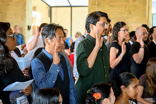 Mike Sudoma/Free Press
New Canadians raise their hands as they swear on the Canadian Oath of Citizenship during a citizenship Ceremony put on by the IRCC at The Forks Wednesday morning
July 29, 2026