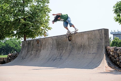 Mike Sudoma/Free Press
Issiah Parisian 5050 grinds on the big vert wall at the Plaza at the Forks Skatepark Wednesday afternoon
Parisian has started skating 12 years through going to the North End YMCA after school. He chose to go to the indoor skatepark consistently over all of the other activities offered there From there he took what he had learned at the YMCA to the Margaret Scott Plaza outdoor skatepark on Arlington St and continues to improve his skills to this day
July 29, 2026