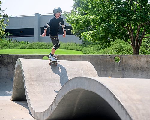 Mike Sudoma/Free Press
Leo Nowell skates the Magic Carpet obstacle at the Plaza at the Forks Skatepark at The Forks Wednesday afternoon
July 29, 2026