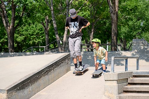 Mike Sudoma/Free Press
Instructor Dylan Byrne teaches young Charlie Nowell how to go down a bank at The Plaza at the Forks Skatepark Wednesday afternoon Free skate lessons are offered through Pihtikwe Skatepark every Tuesday to Saturday 11am to 5pm. Skateboards and helmets are provided
July 29, 2026
