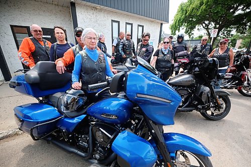 Fifteen riders from the Bordertown Chapter of the Harley Owners Group (HOG) based out of Lethbridge, Alta, take a moment for a group shot a Princess Avenue on Thursday afternoon. The riders had stopped at The Dock on Princess for lunch while on their way to Winnipeg for the start of the 16th Annual Prairie Regional HOG Rally, hosted by Harley-Davidson Winnipeg and the Winnipeg HOG Chapter this weekend. (Matt Goerzen/The Brandon Sun)