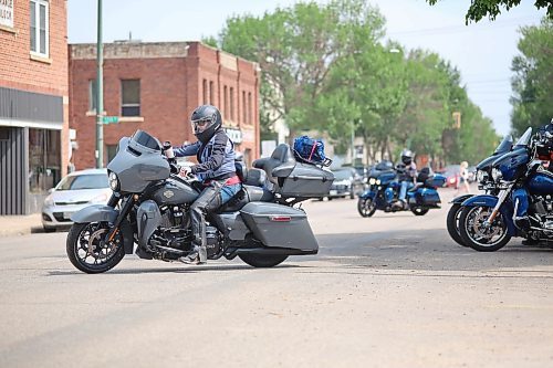 Riders from the Bordertown Chapter of the Harley Owners Group (HOG) based out of Lethbridge, Alta, join the flow of traffic down Princess Avenue on Thursday afternoon. The riders had stopped at The Dock on Princess for lunch while on their way to Winnipeg for the start of the 16th Annual Prairie Regional HOG Rally, hosted by Harley-Davidson Winnipeg and the Winnipeg HOG Chapter this weekend. (Matt Goerzen/The Brandon Sun)
