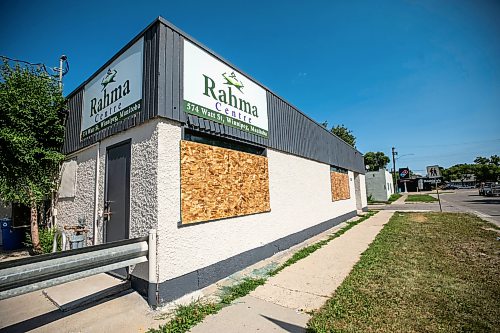Boarded-up broken windows at the Winnipeg Rahma Islamic Centre on Friday. The cost of repairs is estimated at $3,000. (Mikaela MacKenzie/Winnipeg Free Press)
