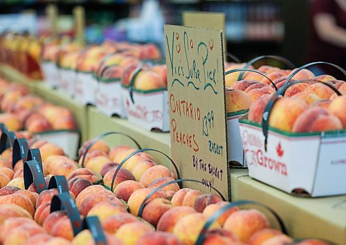 Ruth Bonneville / Free Press

ENT  Vic's market

Baskets of Canadian peaches Friday. 

Story  Fresh fruit and veg at Vic’s Market, : Where to buy seasonal local produce.

Story by AV Kitching

July 31st,  2026