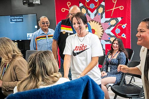 MIKAELA MACKENZIE / FREE PRESS
	
Sarah Cormier shakes hands with everyone in the room (in a traditional clockwise direction) while leaving her last court date at Ga naa na ga da waa ba dang, the Kenora Justice Centre,  on Wednesday, July 29, 2026.

For Dan story.
Free Press 2026