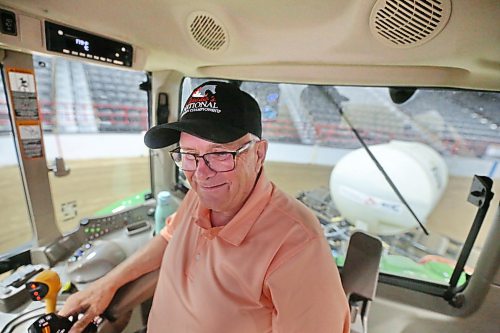 Footing technician Allan Quast with Canada’s National Arabian Championship, operates a tractor in the main arena of the Keystone Centre to level the ground for the horses, in advance of the show’s start next week Thursday here in Brandon. (Matt Goerzen/The Brandon Sun)