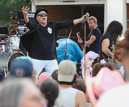 Harlequin lead singer George Belanger gestures to the crowd during Rockin’ the Fields of Minnedosa on Sunday. (Perry Bergson/The Brandon Sun)