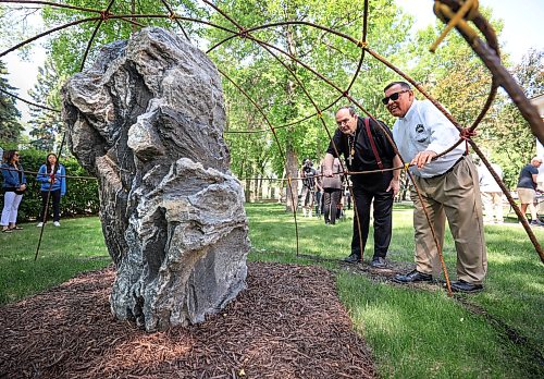 Ruth Bonneville / Free Press
LOCAL - Grandfather Rock
An official unveiling of M'Shoomisanin, the “Grandfather” Rock, took place at the Heritage Garden, on the grounds of de la Cathédral after a ceremony with Elder Clayton Sandy and Archbishop Albert LeGatt and other guests Friday.
The ceremony was part of National Indigenous Peoples' Day, celebrated on June 21st.
June 20th, 2025