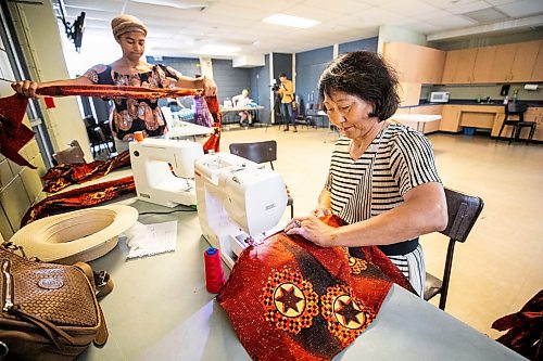 MIKAELA MACKENZIE / FREE PRESS
Volunteer sewer Zhimin Yang works to replace cultural costumes (after the outfits were stolen from a parked vehicle) at the Notre Dame Recreational Centre on Friday, July 31, 2026.
For Chris story.
Free Press 2026