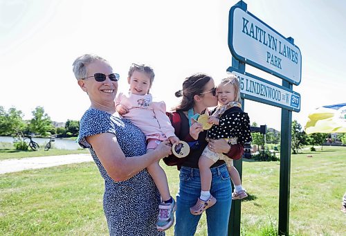 Ruth Bonneville / Free Press
LOCAL - Lawes park
Photo of curler and two-time Olympic gold medallist Kaitlyn Lawes, with her two children Myla (3 1/2yrs) and Ella (1 1/2yrs, right), and her mom, Cheryl Lawes (holding Myla), at ceremony Tuesday.
City of Wpg. officially opened Kaitlyn Lawes Park dedication ceremony at the formerly known as Lindenwood Drive West Park, in honour of Winnipeg curler and two-time Olympic gold medallist Kaitlyn Lawes Tuesday.
See story by Zoe
Aug 4th,, 2026