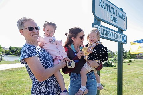 Ruth Bonneville / Free Press
LOCAL - Lawes park
Photo of curler and two-time Olympic gold medallist Kaitlyn Lawes, with her two children Myla (3 1/2yrs) and Ella (1 1/2yrs, right), and her mom, Cheryl Lawes (holding Myla), at ceremony Tuesday.
City of Wpg. officially opened Kaitlyn Lawes Park dedication ceremony at the formerly known as Lindenwood Drive West Park, in honour of Winnipeg curler and two-time Olympic gold medallist Kaitlyn Lawes Tuesday.
See story by Zoe
Aug 4th,, 2026