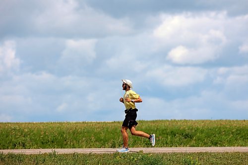 04082026
James Newman runs along the Trans Canada Highway west of Brandon on Tuesday as part of his goal to run across Canada in under 100 days. Newman is using his James Runs Canada run to raise money to support scholarships for youth through the Children’s Aid Foundation of Canada’s Post-Secondary Education Program.
(Tim Smith/The Brandon Sun)