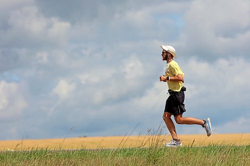 04082026
James Newman runs along the Trans Canada Highway west of Brandon on Tuesday as part of his goal to run across Canada in under 100 days. Newman is using his James Runs Canada run to raise money to support scholarships for youth through the Children’s Aid Foundation of Canada’s Post-Secondary Education Program.
(Tim Smith/The Brandon Sun)