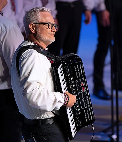 ROBERT LEE / FREE PRESS
The accordionist for the O. Koshetz Young Men’s Choir takes in the moment while accompanying on stage at the Ukraine Kyiv Pavilion for Folklorama on Tuesday, August 4, 2026 at Maples Collegiate in Winnipeg. 