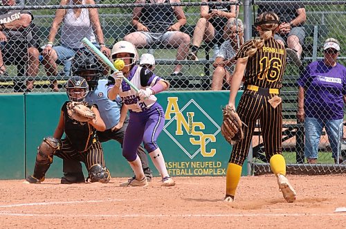 Westman Magic catcher Rachel Lyver and pitcher Callie Franklin (16) watch as Central Energy hitter Sinead Convery (21) tries to bunt the ball during provincials on July 19 in Brandon. (Perry Bergson/The Brandon Sun)
