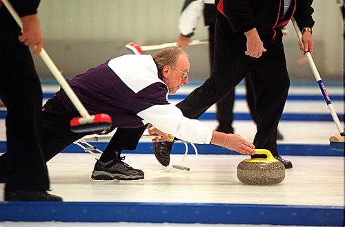 BORIS MINKEVICH/WINNIPEG FREE PRESS Orest Meleschuk lets a rock go at the Strathcona Senior Mens Proviencial Champion East St. Paul Curling Club. He won.