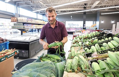 Ruth Bonneville / Free Press

ENT  Vic's market

Nick Mostert, grandson of the original owner of Vic’s Market,  setting out local corn Friday.  

Story  Fresh fruit and veg at Vic’s Market, : Where to buy seasonal local produce.

Story by AV Kitching

July 31st,  2026