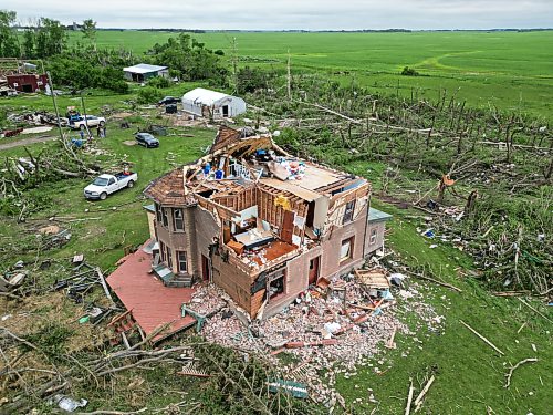 The devastation to the home and property belonging to Brian and Bernadine Brown south of Rossburn is visible after a powerful tornado hit the property on June 28 while the couple was inside. Bernadine said a more targeted warning system would give greater significance to extreme weather alerts. (Tim Smith/The Brandon Sun)