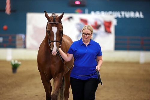 Deb Cross with Silver Sands Performance Horses out of Allendale, Mich., leads her full Arabian Sir Valentino V out of the arena after competing on Thursday. (Tim Smith/The Brandon Sun)