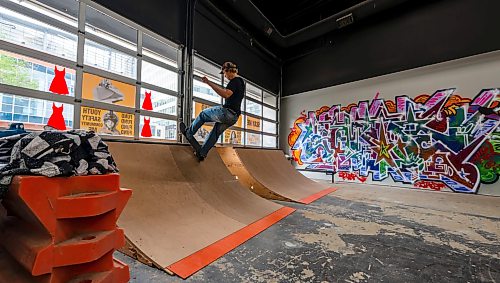 ROBERT LEE / FREE PRESS
Fane Smeall, Pitikwe manager and skater, rides a ramp at the Pitikwe Skatepark in downtown Winnipeg on Thursday, August 6, 2026. The indoor park, formerly in Portage Place, relocated earlier this year to a former Snap Fitness beside the APTN building, continuing the city’s tradition of skateboarders creating their own year-round hubs.
