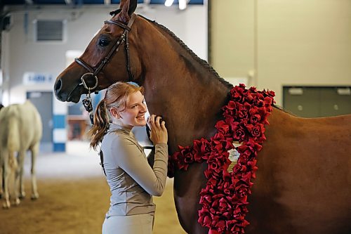 06082026
Handler Taryn Weiss with Silver Sands Performance Horses out of Allendale, Michigan celebrates with her full Arabian Aslan LRA after winning National Champion in the Arabian Sport Horse In-Hand Geldings 2 and Over Hunter Type ATH class at the first day of Canada's National Arabian Championship at the Keystone Centre on Thursday.
(Tim Smith/The Brandon Sun)