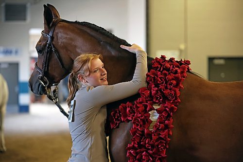 06082026
Handler Taryn Weiss with Silver Sands Performance Horses out of Allendale, Michigan hugs her full Arabian Aslan LRA after winning National Champion in the Arabian Sport Horse In-Hand Geldings 2 and Over Hunter Type ATH class at the first day of Canada's National Arabian Championship at the Keystone Centre on Thursday.
(Tim Smith/The Brandon Sun)