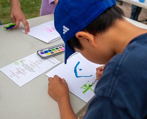 ROBERT LEE / FREE PRESS
Tatsuki, 8, decorates his lantern at Winnipeg’s Memorial Park fountain for the Lanterns for Peace ceremony on Thursday, August 6, 2026, marking 81 years since the atomic bombings of Hiroshima and Nagasaki, which killed more than a quarter million people, mainly civilians.