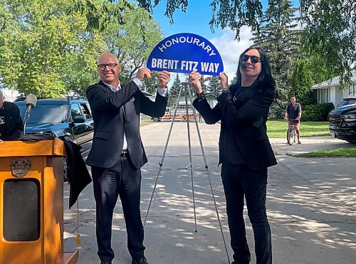TIAGO RESKO / FREE PRESS

Mayor Scott Gillingham unveils Brent Fitz Way with local musician Brent Fitz Friday, August 7, 2026.

