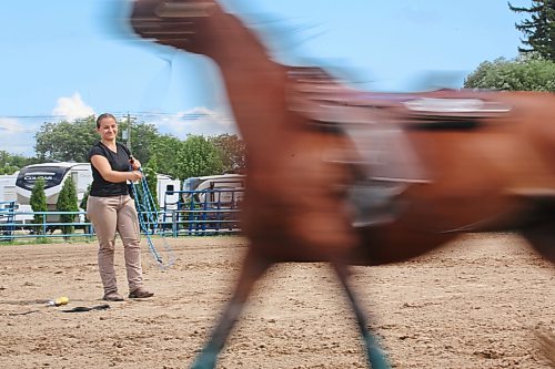 Stephanie Kukhar from Rochester, WA warms up her Arabian horse Oh Heavens to Betsy in the outdoor ring at the Keystone Centre on Friday afternoon. The practice, known as lunging, exercises the horse by running the animal in circles while a rope is attached to the harness and controlled by the rider. (Matt Goerzen/The Brandon Sun)