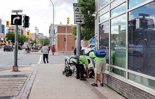 Ruth Bonneville / Free Press

LOCAL -  Main Street scenes after drug enforcement

Workers with DCSP (Winnipeg's Downtown Community Safety Partnership), respond to needs they see while on their walks through the Main Street area on Friday. 

Reporters take walk along  Main near Logan Ave., capturing what it’s like on the streets one day after the Winnipeg Police Service hold news conference on results of drug sweep last month.   

Story on the mood of the community after  June’s 10-day drug enforcement activities, and what are the next steps.

See story by Chris

Aug 7h,,  2026