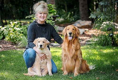 JOHN WOODS / FREE PRESS
Sandra Negrey and her dogs Murphy, left, and Archie at her home Sunday, August 9, 2026. Archie dock dives and Murphy is about to enter his first confirmation show.

reporter: jen