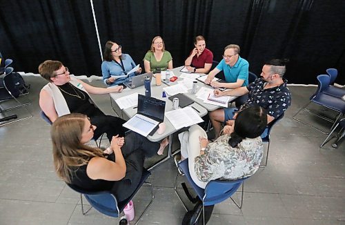 Participants chat at one of several tables set up at Brandon University for a public listening session organized by the province to gather perspectives on the governance and responsible use of artificial intelligence, cybersecurity and the protection of Manitobans’ data. (Matt Goerzen/The Brandon Sun)