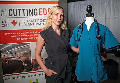 ROBERT LEE / FREE PRESS
Medical student and entrepreneur Kayla Curtis, 28, poses for a photo at The Cutting Edge in Winnipeg on Monday, August 10, 2026. Curtis is a fourth-year medical student at the University of Manitoba and founder of Mediluxe Scrubs Ltd., a women’s medical scrubs brand manufactured at The Cutting Edge, a facility run by the Canadian Women Muslim Institute, which supports refugee and newcomer women and families.