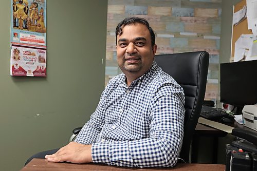 Brandon city council candidate Mitesh Patel, who is campaigning for a seat in Ward 10, poses for a photo at his office in downtown Brandon on Saturday. (Alex Lambert/The Brandon Sun)