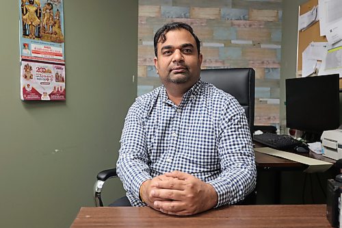 Brandon city council candidate Mitesh Patel, who is campaigning for a seat in Ward 10, poses for a photo at his office in downtown Brandon on Saturday. (Alex Lambert/The Brandon Sun)