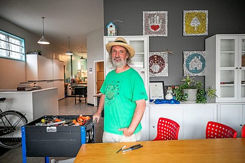 MIKAELA MACKENZIE / FREE PRESS
	
Stephen Kirk where he coordinates a repair cafe every second Wednesday at the Spence Neighborhood Association on Tuesday, Aug. 11, 2026.

For Tiago story.
Free Press 2026