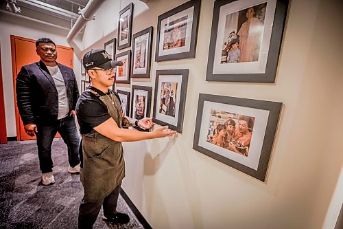 JOHN WOODS / FREE PRESS
Dom Merano, executive chef, right, and Chris Manalastas, vice president of Ture Hospitality are photographed in a wall of staff mothers at House of Ma, a new Asian-fusion restaurant on Bannatyne Tuesday, August 11, 2026. True Hospitality has opened a couple of new ventures on Bannatyne.

reporter: eva