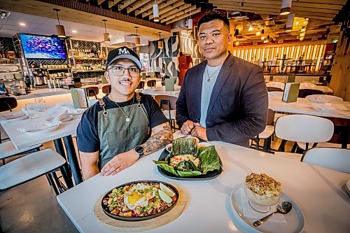 JOHN WOODS / FREE PRESS
Dom Merano, executive chef, left, and Chris Manalastas, vice president of Ture Hospitality at House of Ma, a new Asian-fusion restaurant on Bannatyne Tuesday, August 11, 2026. True Hospitality has opened a couple of new ventures on Bannatyne.
reporter: eva