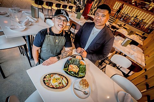 JOHN WOODS / FREE PRESS
Dom Merano, executive chef, left, and Chris Manalastas, vice president of Ture Hospitality at House of Ma, a new Asian-fusion restaurant on Bannatyne Tuesday, August 11, 2026. True Hospitality has opened a couple of new ventures on Bannatyne.
reporter: eva