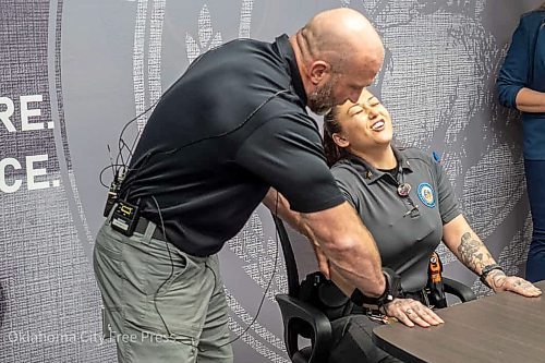 This photo provided by the Oklahoma City Free Press shows Justin Morris demonstrating the G.L.O.V.E. at the Oklahoma County Detention Center in Oklahoma City, March 22, 2023. (Brett Dickerson/Oklahoma City Free Press via AP)