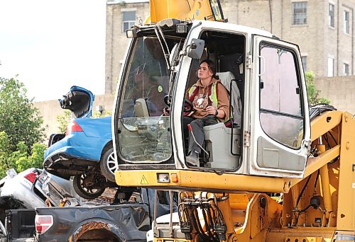 Ruth Bonneville / Free Press

NTERSECTION - crane operator

Photo of young, female crane operator, Harmony Guspodarchuk, operating a  grapple crane during a recent shift at Western Scrap Metal.  

Feature on Harmony, 29, the first female crane operator in Western Scrap's 70-year history. Harmony caught on at the company in 2022 as an office worker but when one of her male colleagues, a crane operator, announced his retirement three years ago, she literally stepped into the driver's seat, replacing him as one of those responsible for tossing scrap cars, fridges and air conditioners around the yard five days a week. 

Shots of Harmony at the controls of one of two cranes she operates (one with a grapple, the other with a ginormous magnet)

Reporter: Dave Sanderson

For Sat Aug 15 Intersection

Aug 12th,,  2026