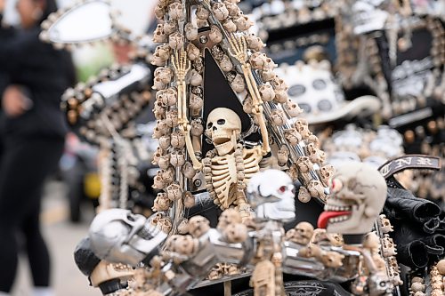 Mike Sudoma/Free Press
A skeleton with its arms up in the air stand out amongst the smaller skulls addorning Wayne van Tassels aka Skullys motorcycle
August 9, 2026