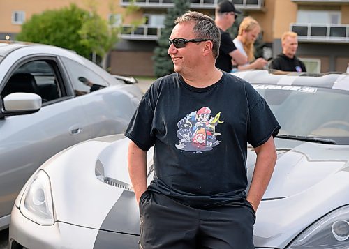 Mike Sudoma/Free Press
Car Enthusiast and Author Dason Wowk leans against his 2014 Dodge Viper GTS at the Winnipeg Cruise Culture car show Sunday night cruise night
August 9, 2026