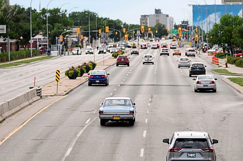 Mike Sudoma/Free Press
A classic car cruises down Portage avenue amongst the modern commuter cars during Sunday night cruise night
August 9, 2026