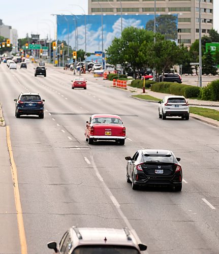 Mike Sudoma/Free Press
A classic car cruises down Portage avenue amongst the modern commuter cars during Sunday night cruise night
August 9, 2026
