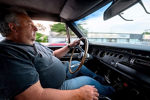 Mike Sudoma/Free Press
Muscle car enthusiast Robert Sudoma drives his 1969 Super Bee down Portage Ave during Sunday night cruise night
August 9, 2026