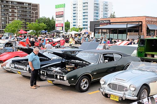 Mike Sudoma/Free Press
Attendees check out the huge variety of cars and motorcycles parked in the Finns Grant Park parking lot during the Winnipeg Cruising Culture car show Sunday night
August 9, 2026